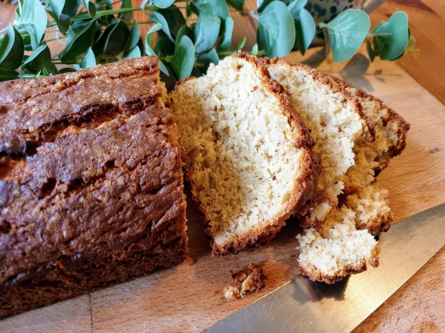 Banana bread on board with knife