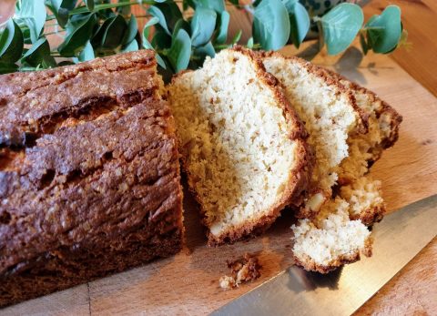 Banana bread on board with knife