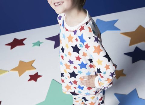 boy in star pyjamas
