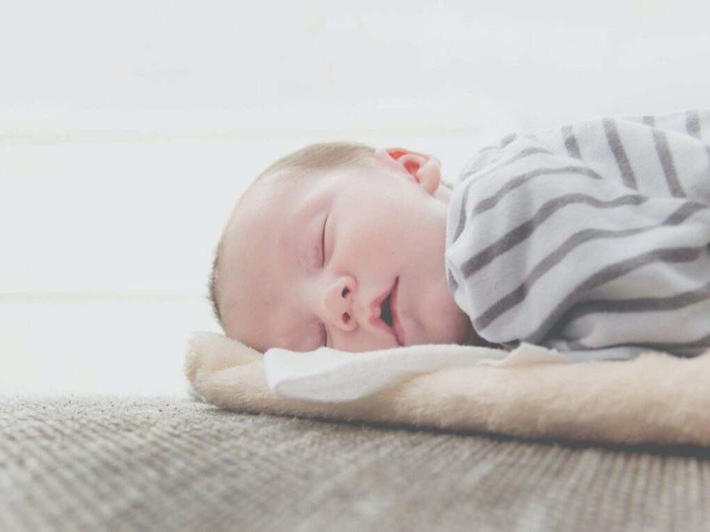 baby lying in a blanket