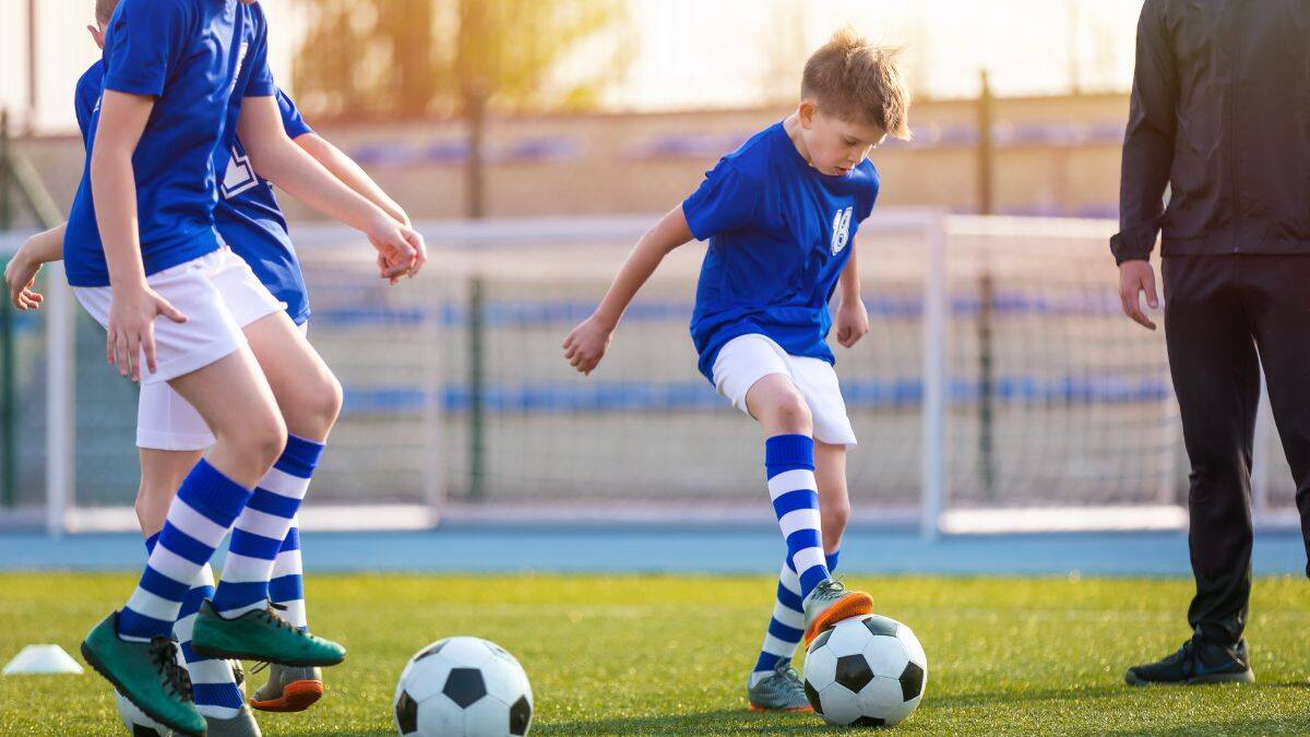boys playing organised football at a sports club
